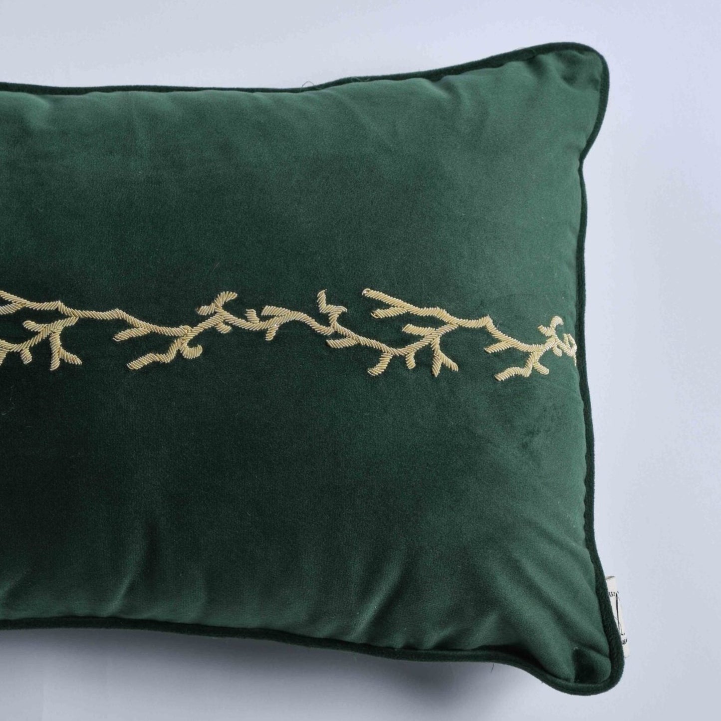 Front View of Green velvet cushion cover with beautiful golden embroidery.